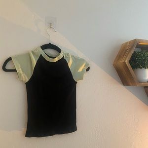 green and black baby tee
